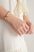 Bead bracelet with charm