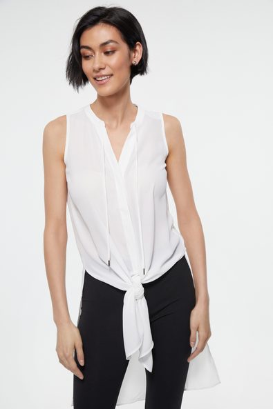 Sleeveless top with side slit