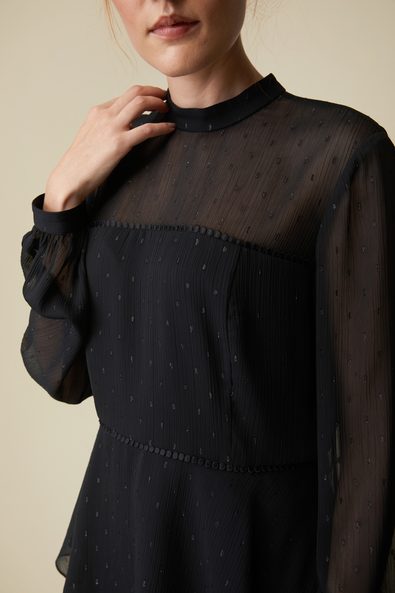 Embellished mock neck blouse with puffy sleeves