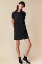 A line dress with vegan leather detail - Black