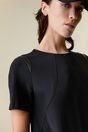 A line dress with vegan leather detail - Black